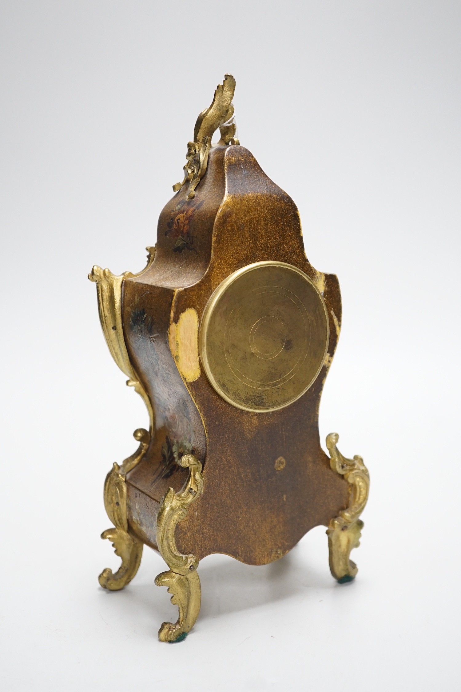 An early 20th century French gilt metal mounted painted mantel timepiece, 25cm